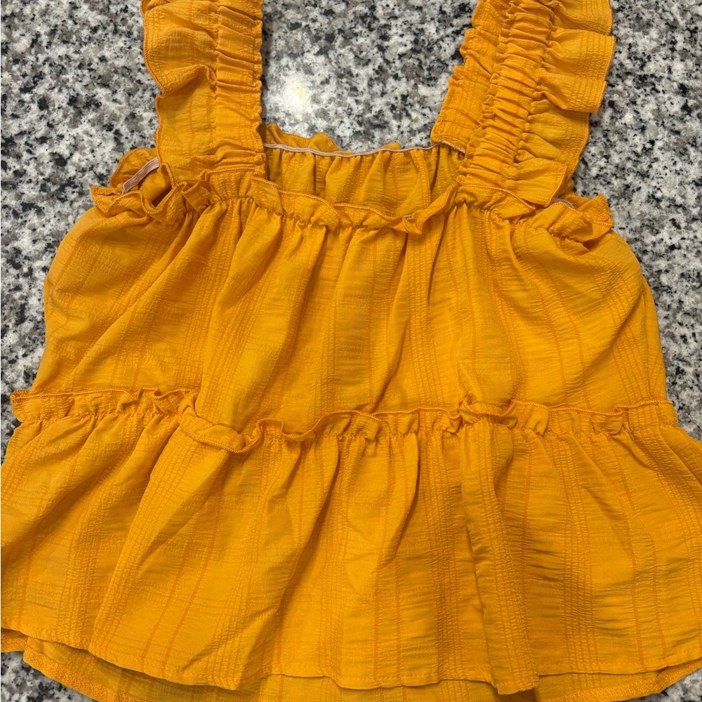 Yellow ruffled cropped shirt